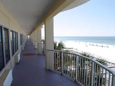 a view of the beach from the balcony of a building at Boardwalk Beach Hotel in Panama City Beach