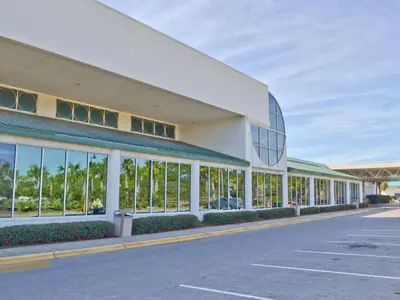 an empty parking lot in front of a building at Boardwalk Beach Hotel in Panama City Beach