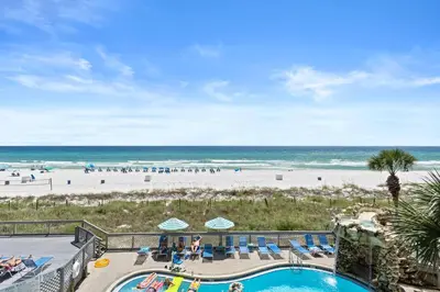 a view of the beach from the balcony of a resort at Edgewater Beach Resort #207 Tower 2 by Book That Condo in Panama City Beach