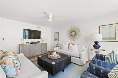a living room with a couch and a table at Edgewater Beach Resort #207 Tower 2 by Book That Condo in Panama City Beach