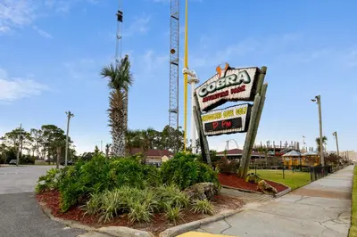 a sign for a soda shop on the side of a street at Edgewater Beach Resort #207 Tower 2 by Book That Condo in Panama City Beach