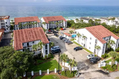an aerial view of a resort with the ocean at Psalms in Santa Rosa Beach