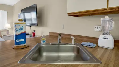 a kitchen counter with a sink and a blender at Hidden Beach 235 in Santa Rosa Beach