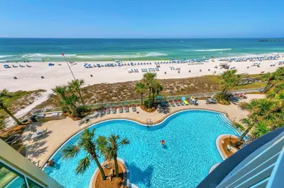 an aerial view of a beach with a swimming pool at Aqua Resort 401 - Piece of Serenity in Panama City Beach