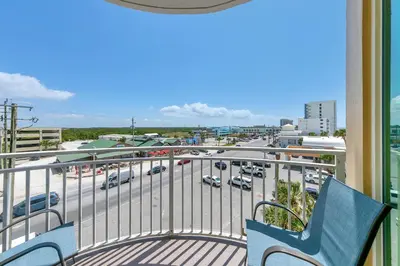 a balcony with a view of a parking lot at Aqua Resort 401 - Piece of Serenity in Panama City Beach