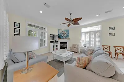 a living room with a couch and a table at Memory Maker II - Modern Home with 4Bedrooms and 3 and a half baths in Seagrove Beach along 30a in Santa Rosa Beach