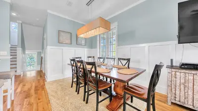 a dining room with a table and chairs at Top of the Dunes - Recently Redecorated Short walk to the Beach in Santa Rosa Beach