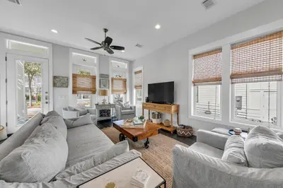 a living room with two couches and a television at Seagrove Serenity - Seagrove Beach 30a 3BD 3BA Home in Santa Rosa Beach