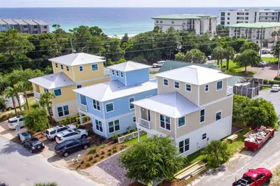 an aerial view of a house with the ocean at Hook, Wine, and Sinker - 3 plus Bedrooms Gulf views on 30A sleeps 12 with a hot tub in Santa Rosa Beach