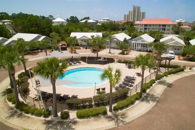 an overhead view of a swimming pool at a resort at Ocean Antics - Close to the Beach and minutes to Seaside along 30A in Santa Rosa Beach