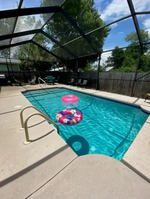 a swimming pool with a frisbee in it at Dolphin house with Private Pool and Near Beach in Panama City Beach