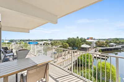 a balcony with a view of the water at Laketown Wharf Resort #238 by Book That Condo in Panama City Beach