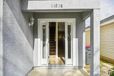 a door to a house with a number on it at Babberville 11818 By Book That Condo in Panama City Beach