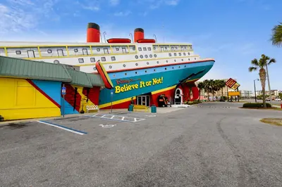 a large cruise ship parked in a parking lot at Babberville 11818 By Book That Condo in Panama City Beach