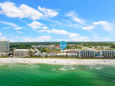 an aerial view of a beach in front of a resort at 2BD/25BA Gulf Front Townhome near Pier Park! Gulf Views! Beach Access! in Panama City Beach