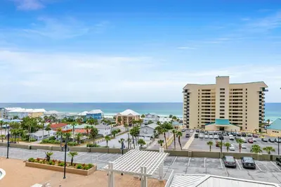 a view of the ocean from the balcony of a resort at Laketown Wharf 607 in Panama City Beach