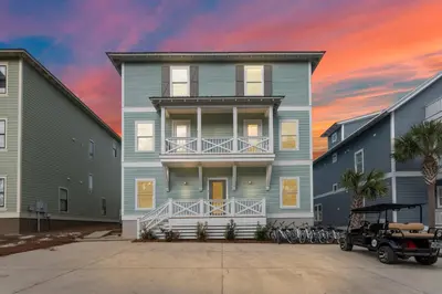 a house with bikes parked in front of it at Waves in Santa Rosa Beach