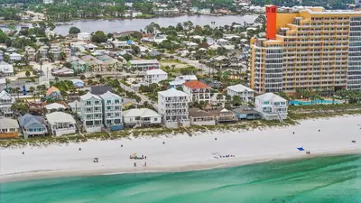 an aerial view of a beach in front of a resort at Beach House - Sugar Sands by Panhandle Getaways in Panama City Beach