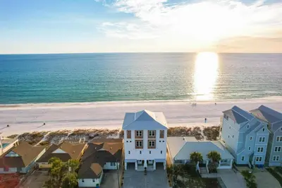 an aerial view of a beach with houses and the ocean at Beach House - Sugar Sands by Panhandle Getaways in Panama City Beach