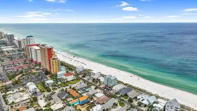 an aerial view of a beach and the ocean at Beach House - Sugar Sands by Panhandle Getaways in Panama City Beach