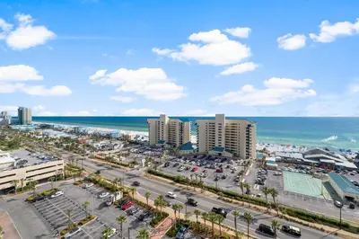 an aerial view of a city and the ocean at Coast is Clear at Laketown Wharf #1225 by Nautical Properties in Panama City Beach