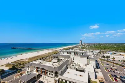 an aerial view of the beach and buildings at Calypso 3-1511 in Panama City Beach