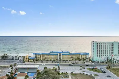 a view of a resort with the ocean in the background at Slice o’ Paradise - Gulf Front! Walk to Pier Park in Panama City Beach
