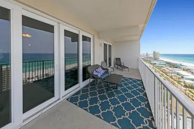 a balcony with a view of the ocean at Gulfview Condo #1809 at Laketown Wharf in Panama City Beach