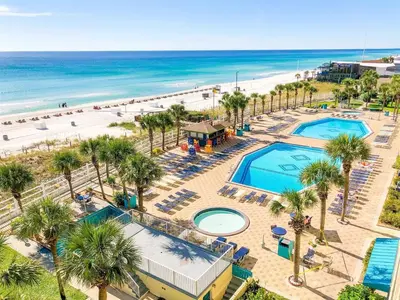 an aerial view of a resort with a pool and the beach at Oceanfront Condo #1320 at Summit in Panama City Beach