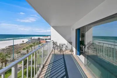 a balcony with a view of the beach at Oceanfront Condo #507 at Summit Beach Resort in Panama City Beach