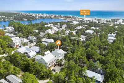 an aerial view of a resort with a sign at 30A Beach House - Beach Please by Panhandle Getaways in Santa Rosa Beach