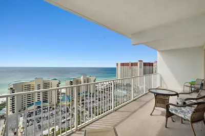 a balcony with a view of the ocean at Laketown Wharf #1807 by Nautical Properties in Panama City Beach