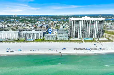 an aerial view of a beach with buildings and the ocean at Nautical Watch 14 B in Panama City Beach