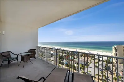 a balcony with a view of the beach at Laketown Wharf #1404 by Nautical Properties in Panama City Beach