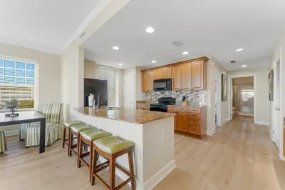 a kitchen with a island and a counter top at Reflections at Bay Point Unit 412 (3/3) in Panama City Beach