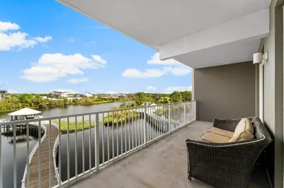 a balcony with a view of a river at Laketown Wharf #311 by Nautical Properties in Panama City Beach