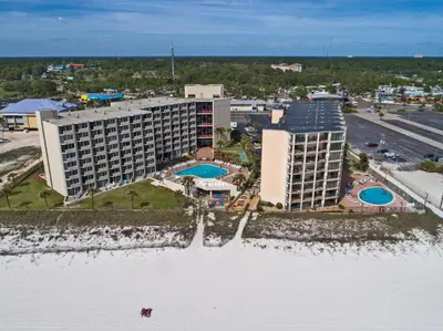 an aerial view of a hotel on the beach at Moondrifter Beach Resort by Panhandle Getaways in Panama City Beach