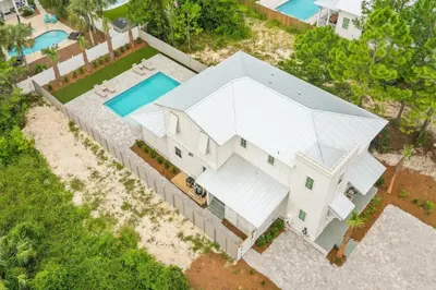 an overhead view of a white house with a swimming pool at 30 A-mazing in Santa Rosa Beach