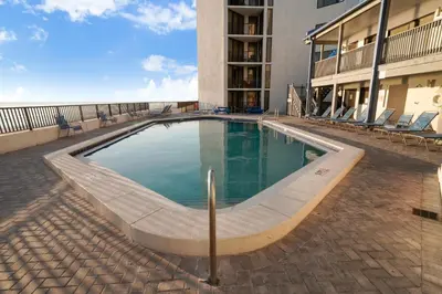 a swimming pool in the middle of a building at Aquavista Condominiums #205-W by Book That Condo in Panama City Beach