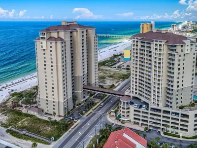 an aerial view of two tall buildings next to the ocean at Grand Panama Beach Resort - The Grand #201 - Sunny Shores in Panama City Beach