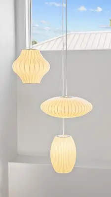 two light fixtures are hanging from a ceiling at NEW Listing! 4 BR/ 3.5 BA, SLEEPS 10, HEATED SALT WATER POOL in Seagrove Beach