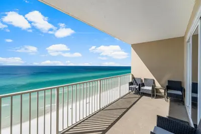 a balcony with a view of the ocean at Spectacular 3BD Beachfront Condo! Spacious! by Dolce Vita Getaways PCB in Panama City Beach