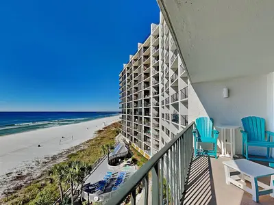 a view of the beach from the balcony of a hotel at Edgewater Tower Iii 504 in Panama City Beach