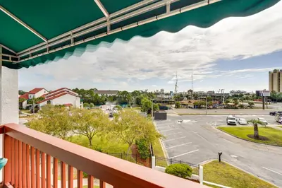 a balcony with a view of a parking lot at Panama City Beach Getaway - Walk to Beaches! in Panama City Beach