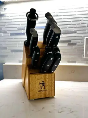 a wooden box full of knives sitting on the floor at Melan Villa Costal Magic Ocean View in Panama City Beach