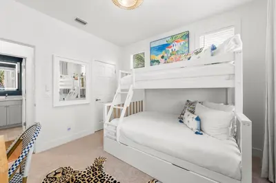 a white bunk bed in a white room at 30A Beach House - Beach Ball by Panhandle Getaways in Inlet Beach