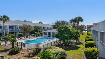 an image of a swimming pool at a resort at Hidden Beach 216 in Santa Rosa Beach