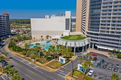 an aerial view of a city with tall buildings at Laketown Wharf #0127 in Panama City Beach