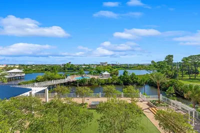 an aerial view of a river with a dock at Laketown Wharf #0201 in Panama City Beach