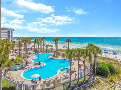 a view of the pool at the resort with the beach at Grand Panama #1-1705 in Panama City Beach